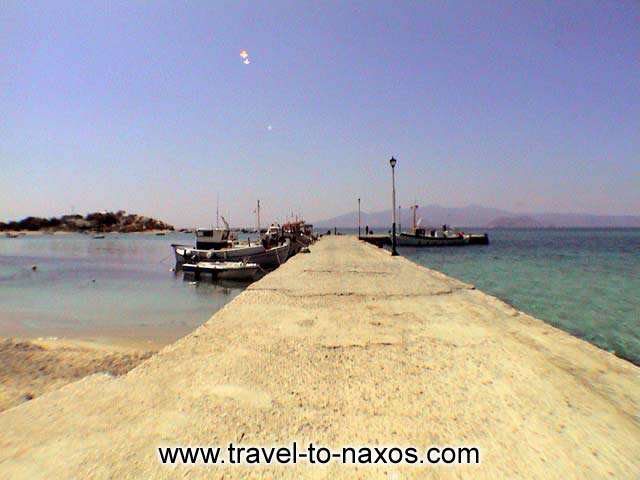 THE PORT - The small fishing port of Agia Anna with the fishing boats and Paros in the background