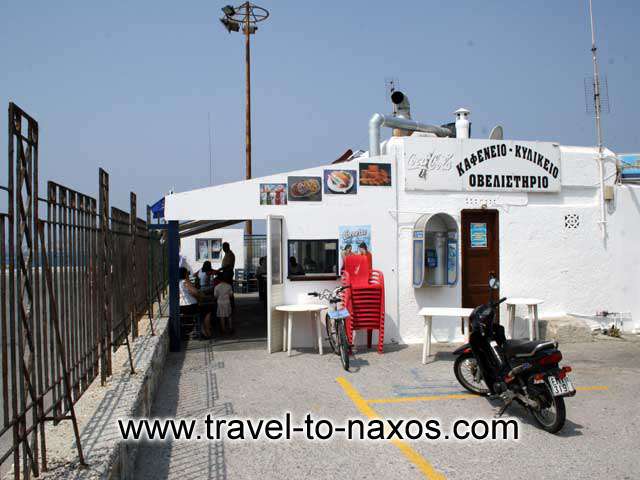 NAXOS PORT - Kafeneio in Greek means coffee shop, however this one will remain in our mind <br>for grilled octapus and souma (the local spirit)