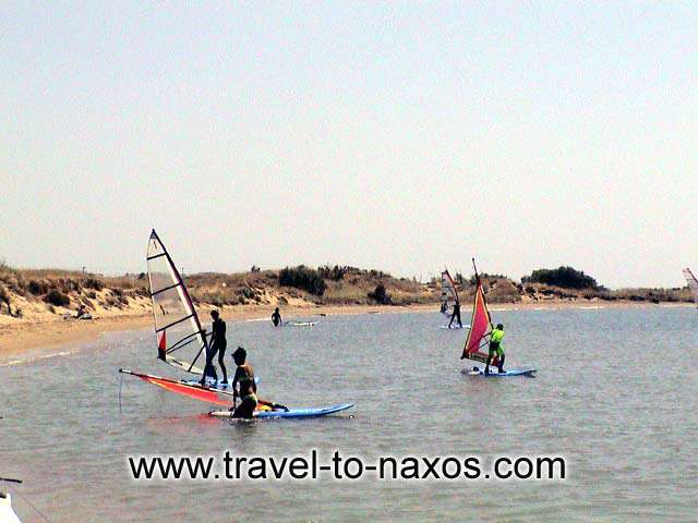 AGIOS GEORGIOS BEACH - Agios Georgios beach is very closed to Chora and there you'll do sea sport.